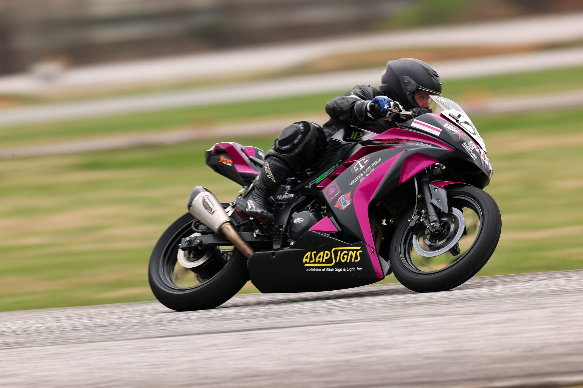 John racing the motorcycle