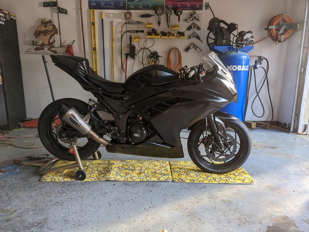 2023 motorcycle race preparation includes turning this black bike into something dynamic